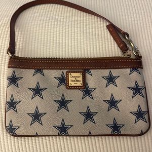 Dooney & Burke wallet/wristlet with zipper. Dallas cowboys print